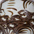 Rustic Brown Four Loop Handle Jar Twisted Flower Motif