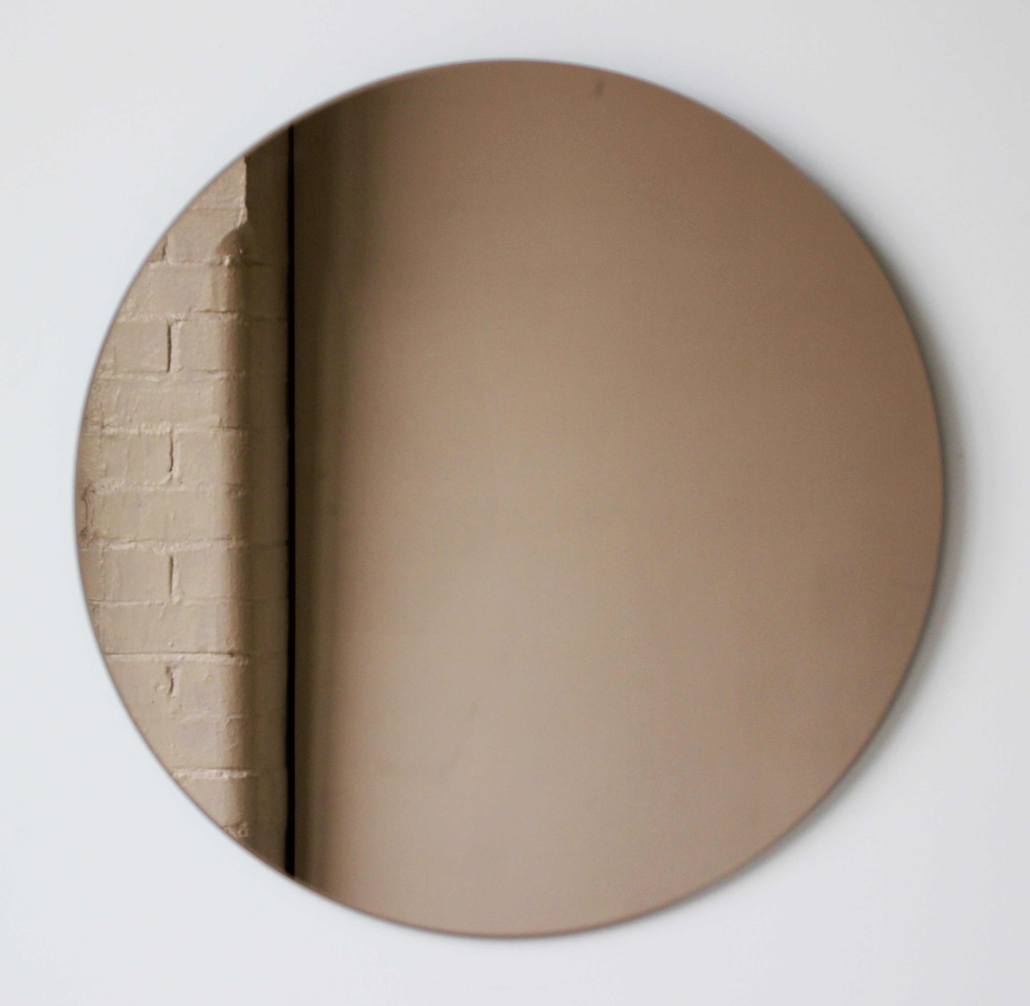 alguacil-perkoff-bronze-tinted-orbis-round-mirrortm-frameless-modern