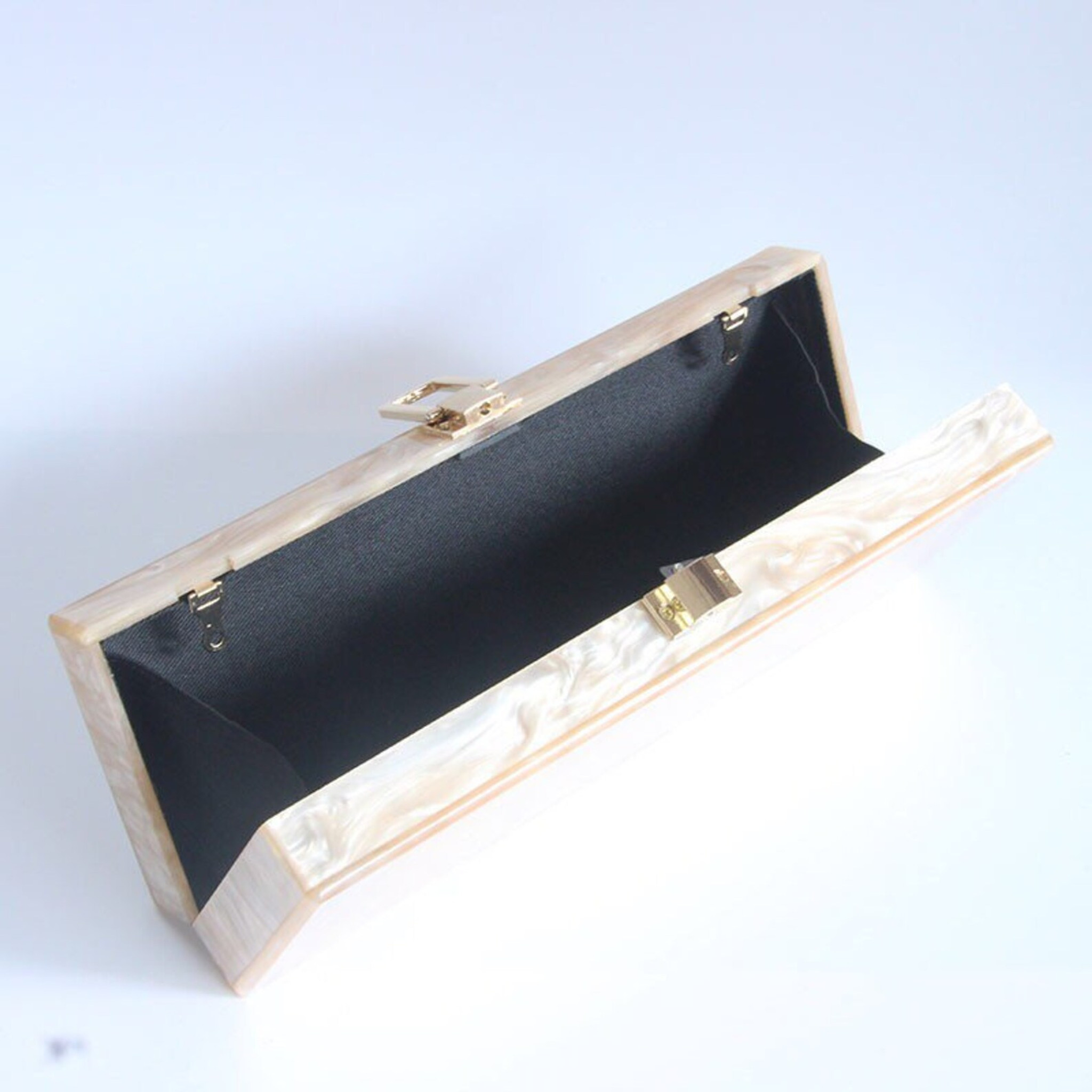 Pearlized Champagne Clutch with Tortoise Chain