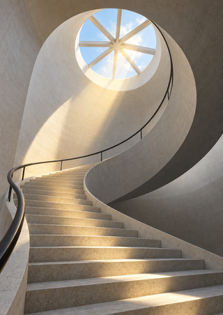 Pale curved stone staircase rising toward a circular skylight, with a dark handrail and sunlight across the steps.