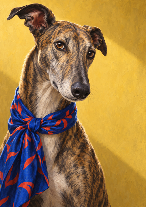Chest-up portrait of a brindle greyhound wearing a blue scarf with orange-red abstract shapes against a warm yellow wall.
