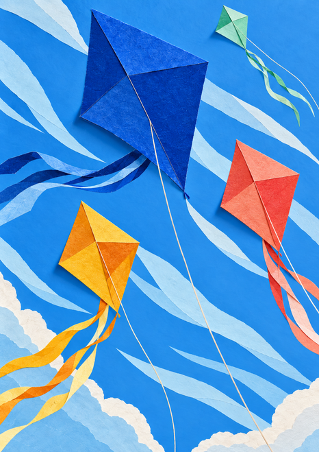 Four colorful faceted paper kites rise through a bright blue sky with trailing strings and streamers and sweeping pale wind ribbons.
