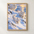 Three white arctic foxes on a snowy slope, with one smaller fox in the foreground, icy mountains, and warm light in the sky.; frame shown for styling only