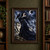 Dark-gowned woman reaches toward a dark orb while a raven perches on her arm among storm clouds and ruined stone structures.; frame shown for styling only