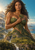 Leaf-adorned woman holding a sprig as her lower figure merges into a sunlit landscape of mountains, rivers, and waterfalls.