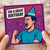 Funny Comic Birthday Card - Shouting Party Hat Bloke with Confetti and Speech Bubble 'TAV A GREAT BIRTHDAY' - Pop Art Humour for Friends or Workmates