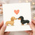 Cute Dachshunds Love Card - Sausage Dog Couple with Heart - Anniversary or Valentine’s Day Card for Dog Lovers - Blank Inside - A6 Greeting with Envelope