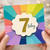 7th Birthday Card, Colourful Rainbow Sunburst Design