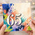 65th Birthday Card, Colourful Watercolour Splash Design