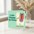 Personalised Llama Birthday Card for Lola - Cute Alpaca with Present - Kids Girls Greeting Card - Fun Illustrated Happy Birthday