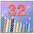 32nd Birthday Card, Colourful Candles and Fireworks Celebration Card