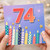 74th Birthday Card, Colourful Candles and Fireworks Design