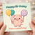 Cute Pig Birthday Card - Happy Birthday - Kawaii Cartoon Pig with Balloons and Lollipop - Have a Sweet Day - Fun Kids and Adults Design