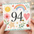 94th Birthday Card, Watercolour Rainbow Sun and Flowers Design