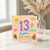 13th Birthday Card, Cute Colourful Happy Birthday Card with Sun, Rainbow and Fun Fruit Design