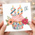 80th Birthday Card, Colourful Cupcake and Floral Candle Design