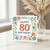 Happy 80th Birthday Card - Colourful Floral Border, Bold Typographic Greeting for Milestone Celebration