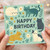 Happy Birthday Cats Card - Cute Illustrated Kittens with Daisies on Pastel Green, 'HAPPY BIRTHDAY' Text - Perfect for Cat Lovers, Friends or Family