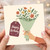 Happy Birthday Card - Floral Bouquet Illustration with Gift Tag, Hand-Held Flowers, Warm Pastel Design