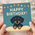 Cute Dachshund Puppy Happy Birthday Card - Sausage Dog on Cushion with Party Bunting - For Dog Lovers, Friends or Family