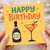 Happy Birthday Bubbles Champagne Bottle & Cocktail Card - Fun Celebration Design with 'HAPPY BIRTHDAY'