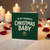 To My Favourite Christmas Baby Card - Cute Festive Card for Partner, Boyfriend or Girlfriend - Dark Green Design with Stars and Gift Icon