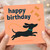 Happy Birthday Card - Playful Dachshund Chasing Biscuit Bones - Cute Sausage Dog Design for Dog Lovers, Friends & Family