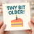 Funny Birthday Card - 'Tiny Bit Older!' Cake Slice with Candle - Playful Humour for Friends or Family