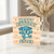 Happy Birthday Sister Card - Cute Blue Puppy on Pastel Stripes with Flowers - Fun Children’s Design