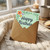 Happy Birthday Card with Floral Border on Soft Green - Pastel Flowers and Leaves, Cheerful Birthday Greeting for Anyone