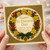 St David's Day Card - Happy St David's Day - Welsh Dragons and Daffodil Wreath with Celtic Knot Border - Celebrating Welsh Heritage and Springtime Joy