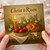 Christ is Risen Easter Card - Religious Design with Candle, Red Eggs, Braided Bread and Spring Blossoms