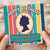 Funny Birthday Card For Her - From One Queen to Another - Colourful Stripes and Crown Cameo Design