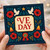 VE Day Greeting Card - Commemorative Celebration with Doves, Poppies, Bells and Rosette - Bold VE DAY Typography on Navy