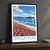 Brighton, England travel poster bordered print styled in Black frame / charcoal wall; frame and props not included
