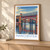 Manchester, England travel poster bordered print styled in Light oak-console; frame and props not included