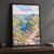 Snowdonia, Wales travel poster full-bleed print styled in Black frame / charcoal wall; frame and props not included
