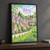Bibury, England travel poster full-bleed print styled in Black frame / charcoal wall; frame and props not included