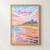 Bamburgh, England travel poster full-bleed print styled in Front oak frame - corrected opening; frame and props not included