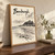 Bamburgh, England travel poster full-bleed print styled in Original angled oak-console; frame and props not included