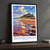 Bamburgh, England travel poster bordered print styled in Black frame / charcoal wall; frame and props not included