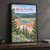 Yellowstone National Park, United States travel poster full-bleed print styled in Black frame / charcoal wall; frame and props not included