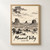 Monument Valley, United States travel poster full-bleed print styled in Front oak frame - corrected opening; frame and props not included