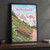 Mount Rainier National Park, United States travel poster full-bleed print styled in Black frame / charcoal wall; frame and props not included