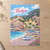 Positano, Italy travel poster full-bleed print styled in Unframed sheet - corrected A-series; frame and props not included