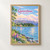 Queenstown, New Zealand travel poster full-bleed print styled in Front oak frame - corrected opening; frame and props not included