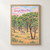 Serengeti National Park, Tanzania travel poster full-bleed print styled in Front oak frame - corrected opening; frame and props not included
