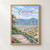 Caracas city view full-bleed print styled in Front oak frame - corrected opening; frame and props not included