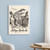 Antigua Santa Catalina Arch full-bleed print styled in White frame / blue sitting room; frame and props not included