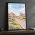 Scotts Bluff from the Oregon Trail full-bleed print styled in Black frame / charcoal wall; frame and props not included